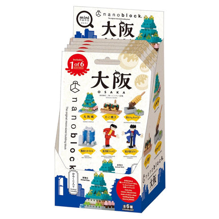 A box containing a set of miniature figurines depicting various landmarks and scenes from Osaka, Japan.