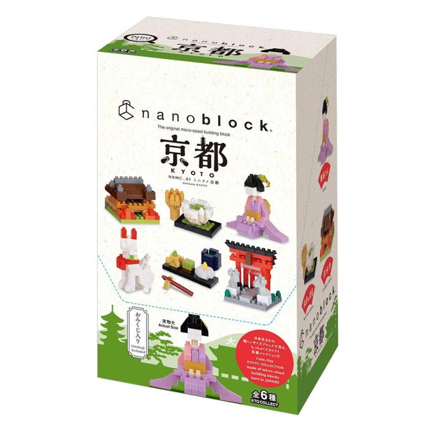 The image is a box containing a set of miniature figurines, including a woman, a cat, and a bird, as well as other small objects.