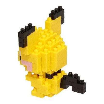 A yellow and black pixelated character made of small building blocks.
