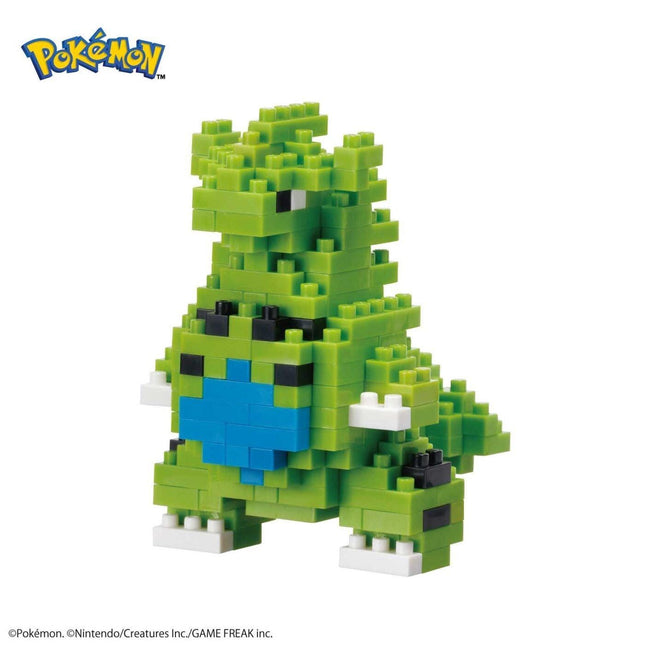 A green pixelated Pokemon character made up of small blocks, with a blue heart-shaped element on its chest.