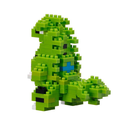 A green Lego dinosaur made up of numerous small Lego bricks.