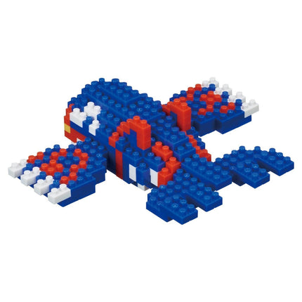 A colorful toy made of building blocks in shades of blue, red, and white.