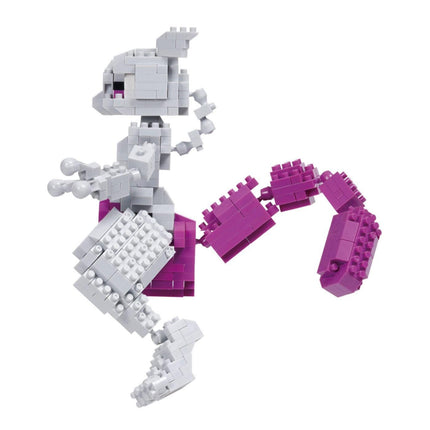 A toy figure made of small, colorful building blocks in shades of gray and purple.