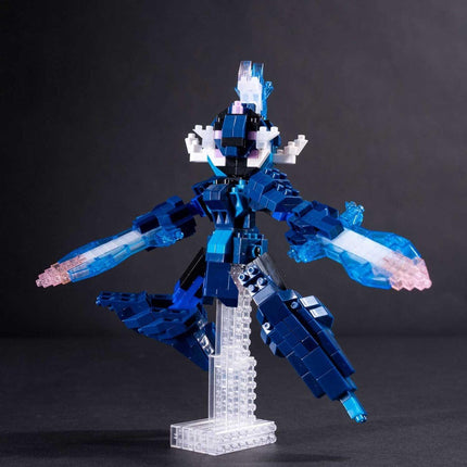 A blue and white Lego robot with multiple arms and legs stands on a clear base against a dark background.