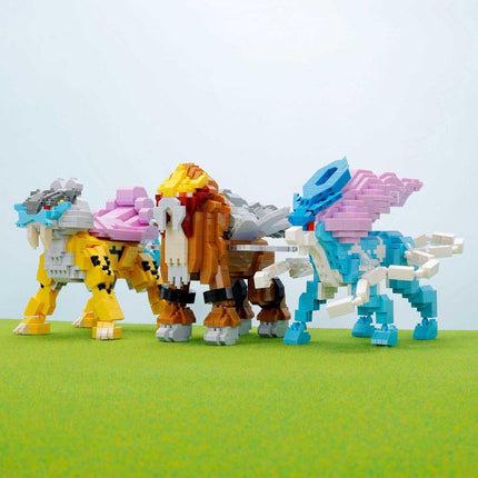A group of colorful, pixelated toy animals standing on a green surface.