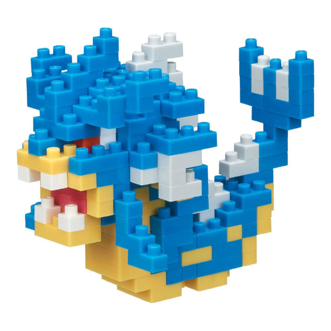 A colorful and intricate LEGO brick model of a dragon-like creature, composed of various blue, yellow, and white LEGO bricks.