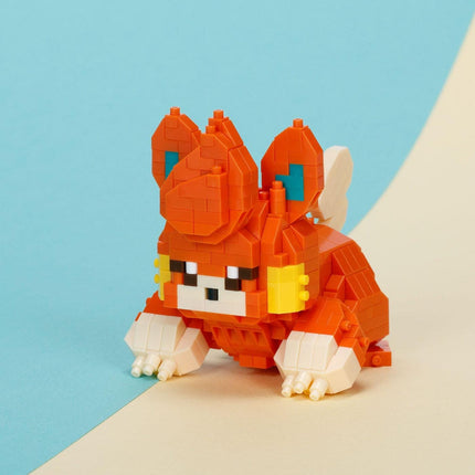 A colorful, pixelated toy resembling a character from a video game, made up of small, orange and white blocks.