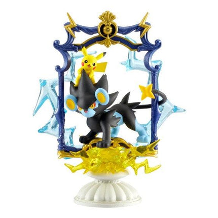 A figurine of Pikachu and another Pokémon character, likely Charizard, standing on a base with a lightning bolt design.
