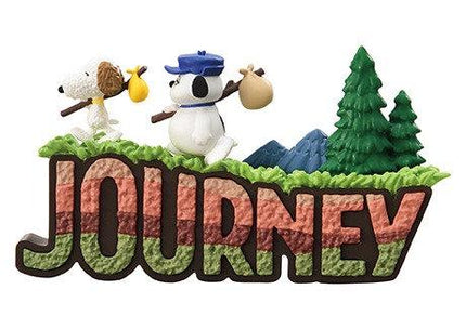 A colorful and whimsical image featuring the word "Journey" with various cartoon-like elements, including a dog, a snowman, and pine trees.