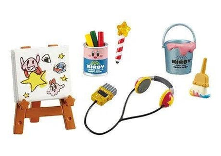 various small toys and objects, including a toy easel, a toy paint bucket, a toy paintbrush, a toy headphones, and a toy microphone.