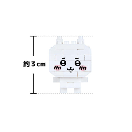 A white, cartoon-like character with a face and eyes drawn on it, along with measurements indicating it is 3 cm in height.