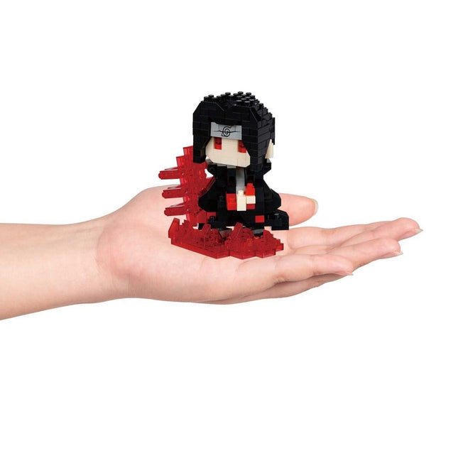 A hand holding a small, black and red figurine made of small, red and black building blocks.