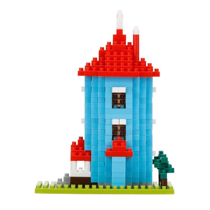A colorful, two-story building made of building blocks, with a red roof and a small tree on the ground.