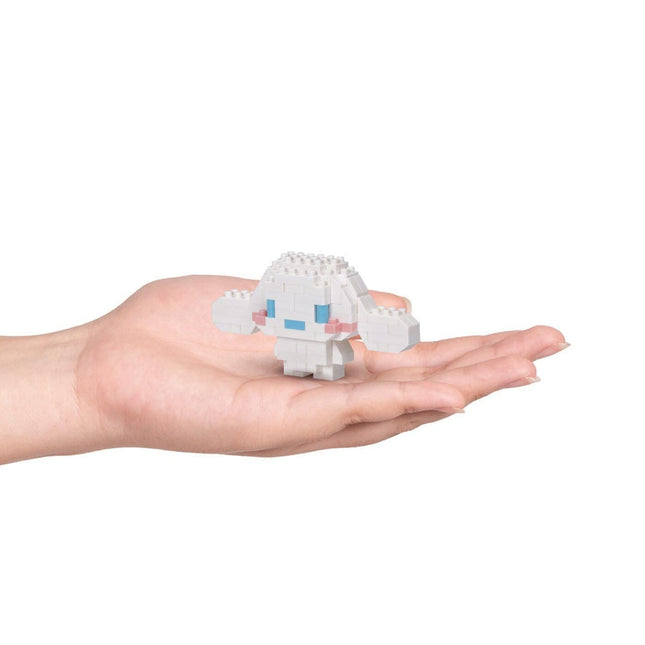 White Cinnamoroll nano block figure held in hands, blue and pink accents