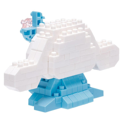 A white and blue toy made of small building blocks, resembling a cloud or a castle-like structure.
