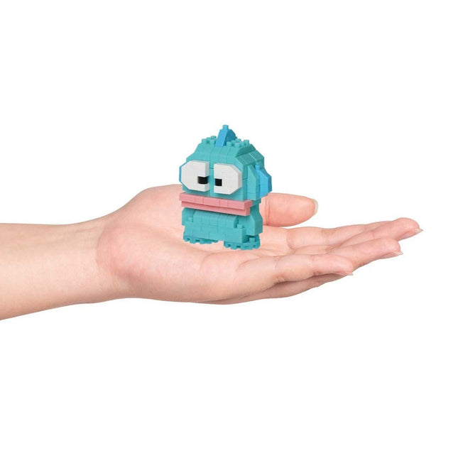 Hangyodon nano building blocks figure held in hand, turquoise with white eyes and pink trim