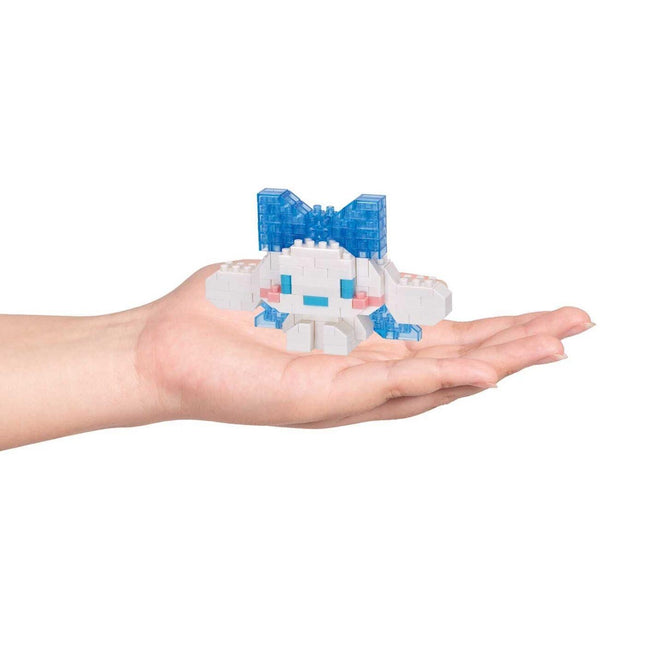 Hand holding a white and blue Cinnamoroll nano building block model