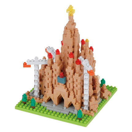 A colorful and intricate model of a castle made out of small building blocks, with various towers and turrets.