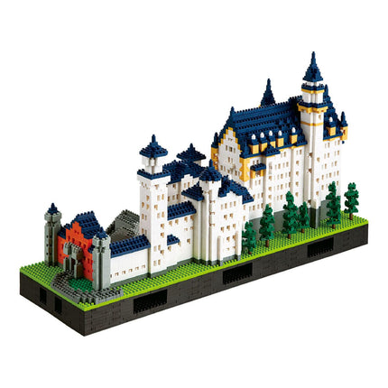 A detailed model of a castle made of small, colorful building blocks.