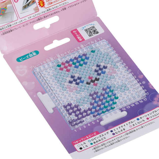 a colorful mosaic pattern with various shades of blue, purple, and pink dots arranged in a grid-like pattern.