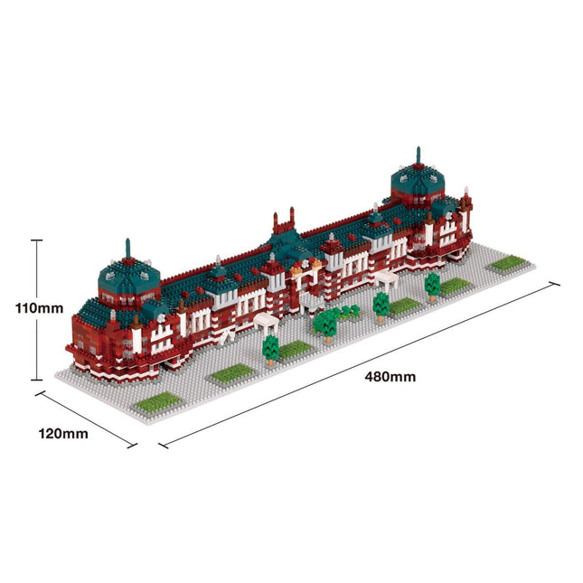 A 3D model of a building with a red and green color scheme, featuring multiple domes and towers.