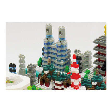 A collage of various Lego structures, including towers, buildings, and other architectural elements, arranged in a visually appealing manner.
