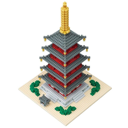 A 3D model of a Japanese pagoda made of small, colorful building blocks.