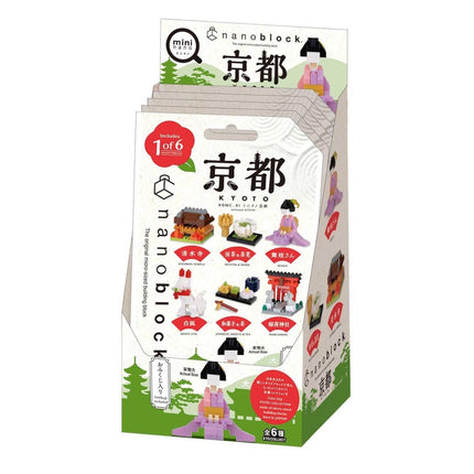 The image is a box containing a set of miniature figurines representing various scenes from Japan, including traditional buildings, landscapes, and people.