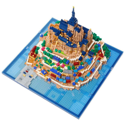 A detailed model of a castle or palace, constructed from colorful building blocks, displayed on a blue base.