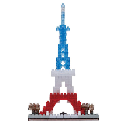 A colorful and intricate model of the Eiffel Tower made up of various building blocks in red, white, and blue colors.