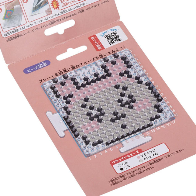 Perler beads pattern sheet in packaging with black, gray, and pink bead layout