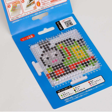 a blue plastic packaging with instructions and a pattern for a bead mosaic kit.