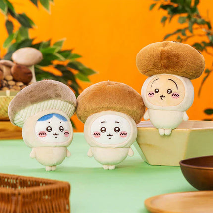 Seasonal plush keychains: three small characters with knit hats in tan and brown