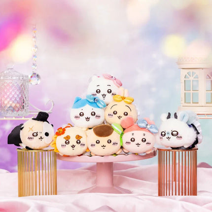 Set of cute plush mini mascots with bows, embroidered faces, and hanging charm strings.