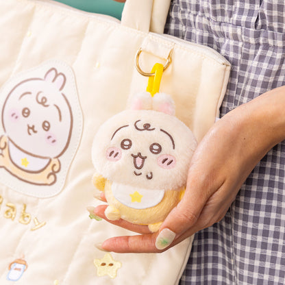 Chiikawa baby canvas tote bag with embroidered face and a small plush charm